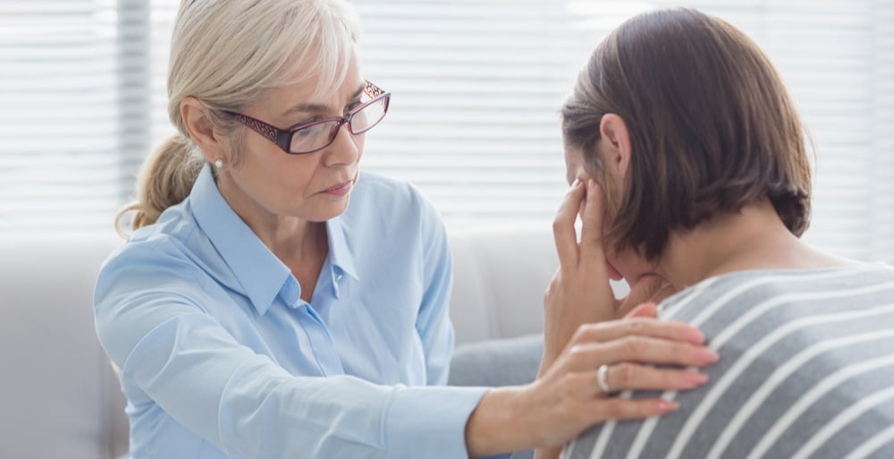 Outpatient Rehab for Drug Addiction North Jersey Recovery Center - A woman participates in a one-on-one counseling session at home with a professional rehab facilitator as part of her Outpatient Treatment Program