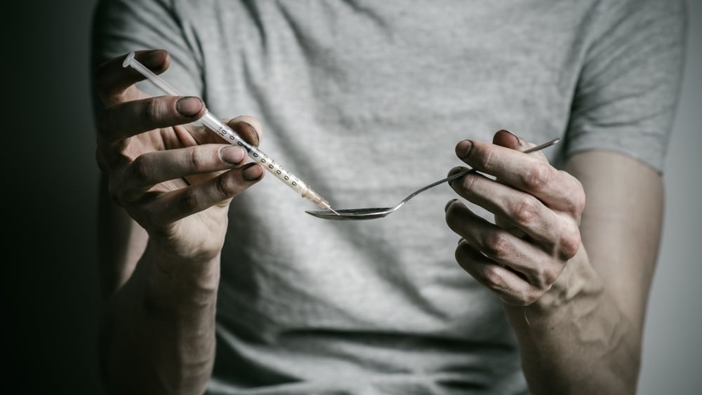 Signs of a Heroin Addiction North Jersey Recovery Center - Because heroin is one of the most addictive substances, a man is struggling trying to stop using the drug and is debating entering a heroin rehab center.