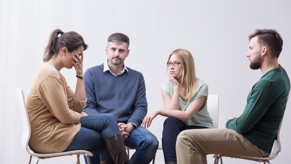 Vicodin Addiction, Abuse, and Treatment - North Jersey Recovery Center - A small group of men and women discuss their Vicodin during group therapy.