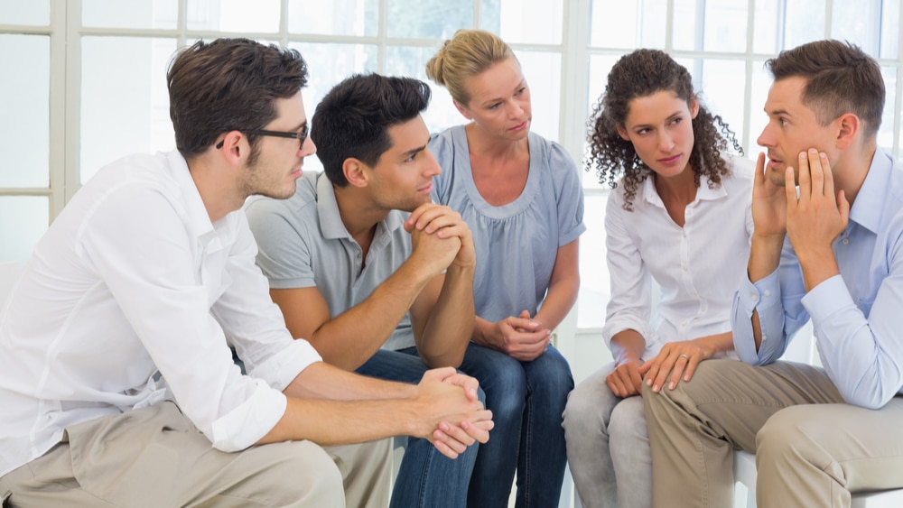 Over-the-Counter Drug Addiction: Abusing OTC Drugs North Jersey Recovery Center - A group of individuals are participating in a therapy session to discuss their over the counter drug abuse in an open and safe environment, where they can support one another on the road to recovery.