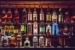 Shelves of alcohol at bar