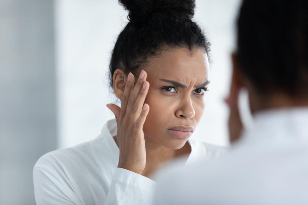 Woman with premature aging from alcohol abuse