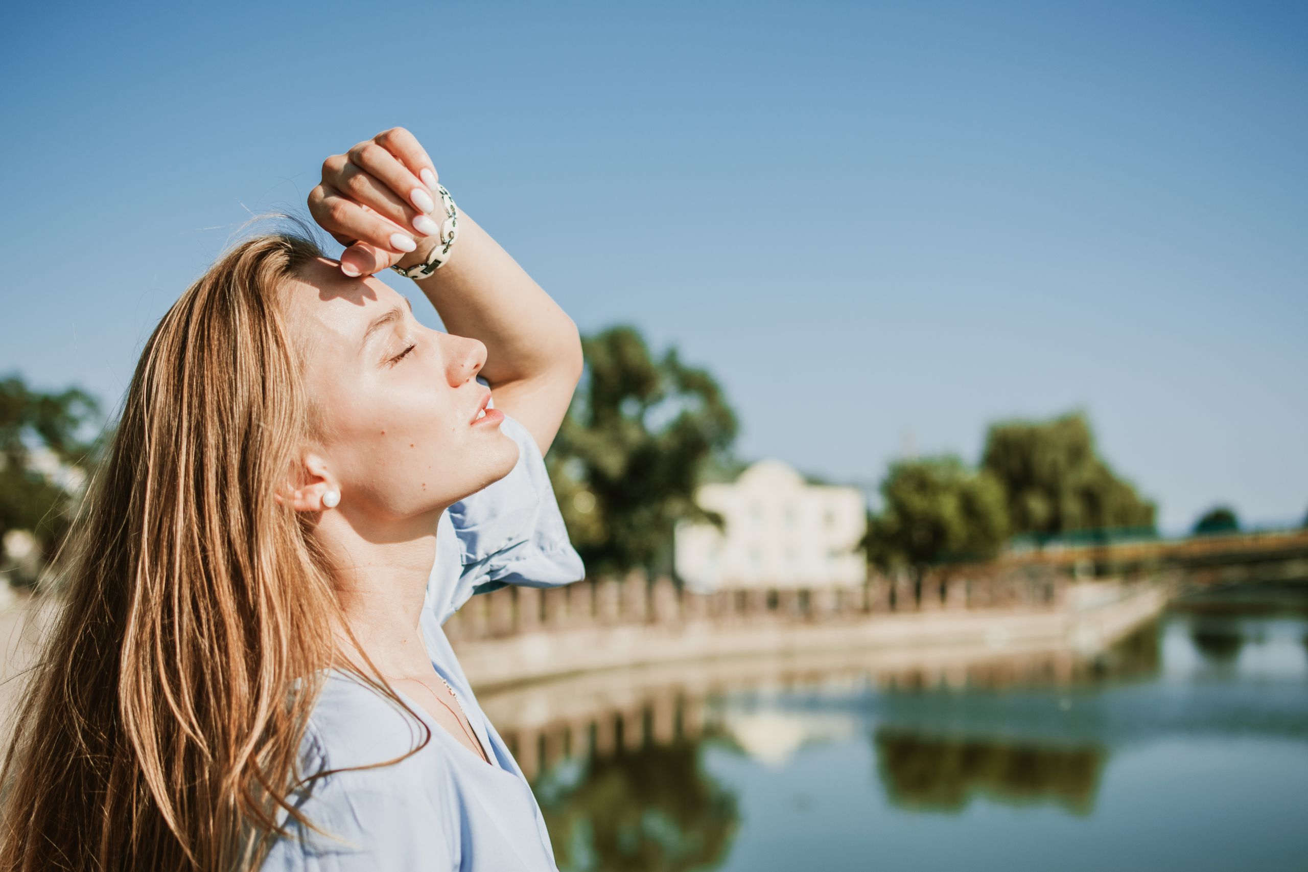 woman feeling lethargic after drinking Alcohol in the summer heat